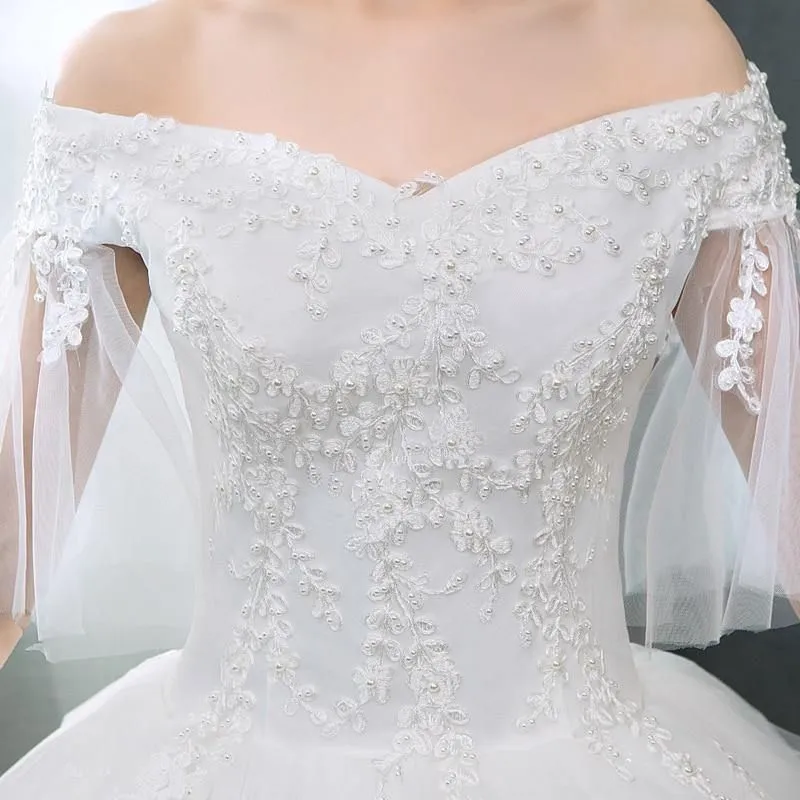 Elegant Beaded Wedding Dress with Appliques
