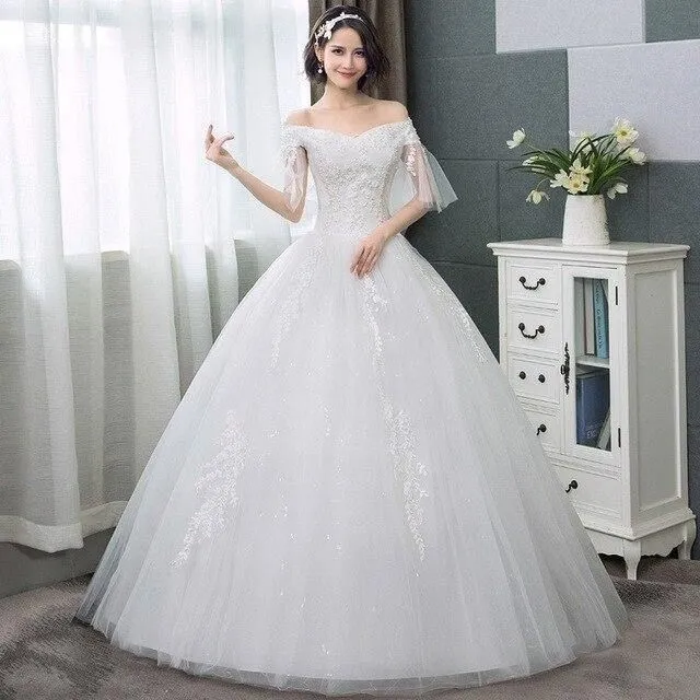 Elegant Beaded Wedding Dress with Appliques