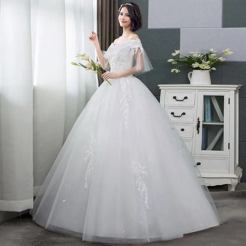 Elegant Beaded Wedding Dress with Appliques