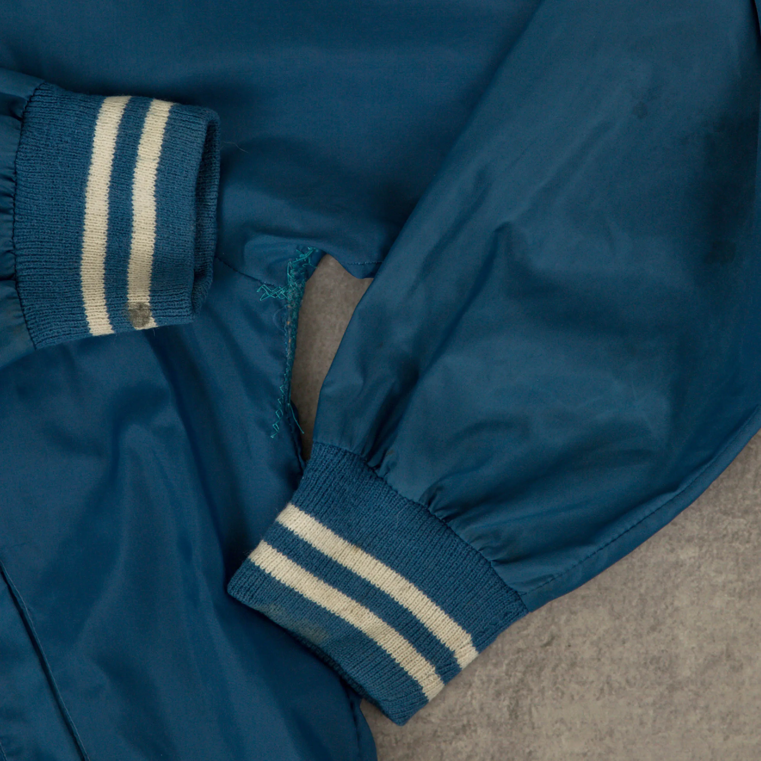 MEN'S VINTAGE 1990S ALASKA NYLON VARSITY BOMBER JACKET - LARGE
