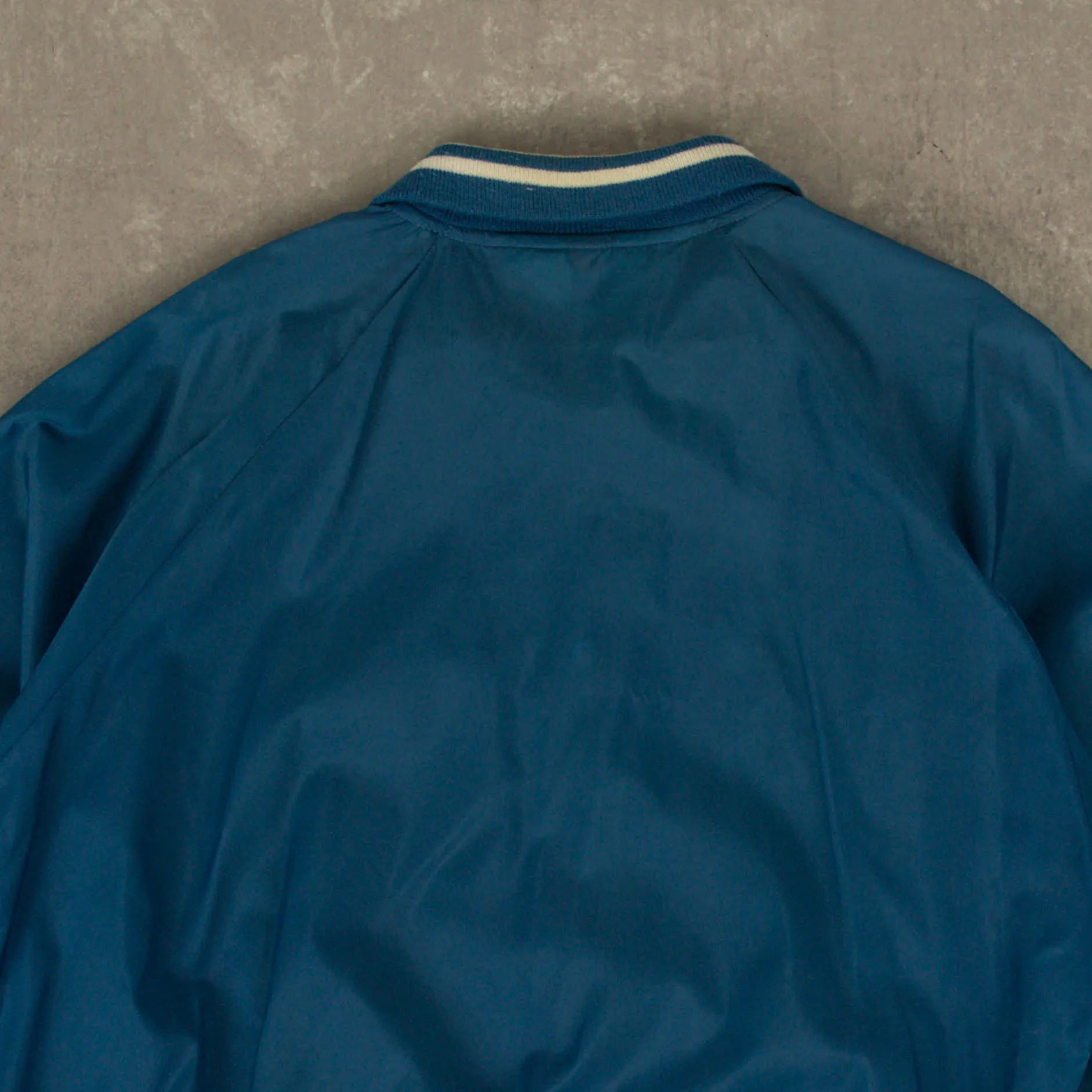MEN'S VINTAGE 1990S ALASKA NYLON VARSITY BOMBER JACKET - LARGE